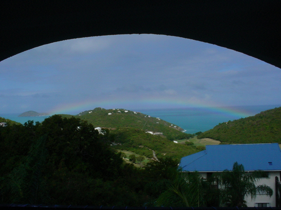 Rainbow matching the curvature of our patio ceiling.